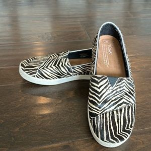 Toms zebra slip on shoes. Woman’s size 7